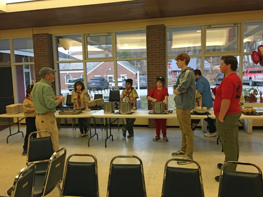 Boy Scouts serving Sunday Supper