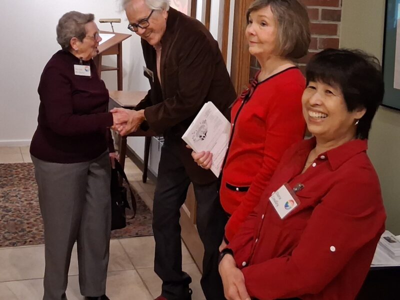 Deacons welcoming folks
