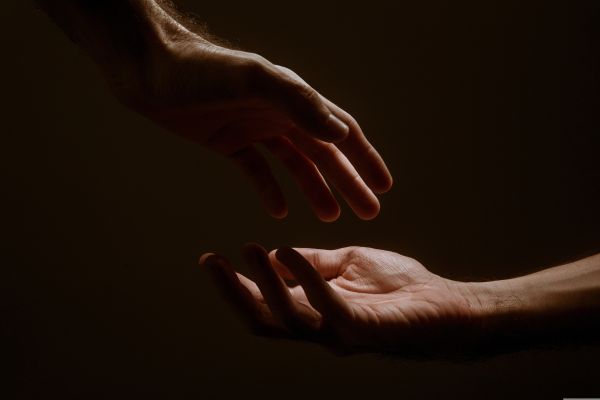 One hand helping another